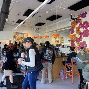 a group of people in a library