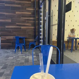 Outside seating (not wheelchair/low mobility friendly due to heavy front doors/no handicap assistance button)