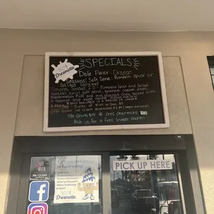 a sign on the wall of a restaurant
