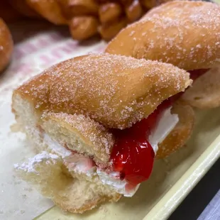 Twist with strawberry and whipped cream filling