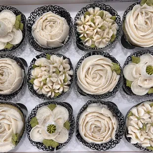 a dozen cupcakes in a box