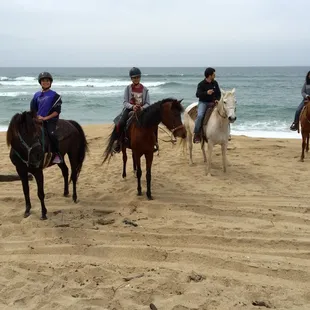 Mindy will get a group picture in front of the ocean.  Do those kids look happy or what?