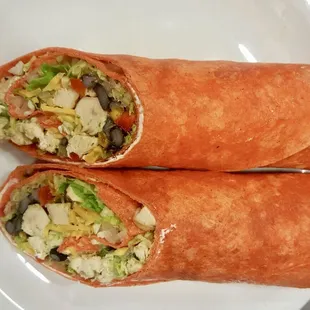 two burritos on a plate