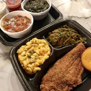From front to back: catfish, mac &amp; cheese, green beans, yams, collard greens