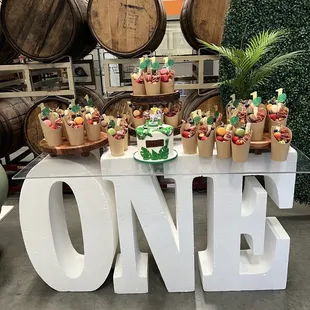 One Table- So CUTE but careful, tabletop not attached. Only recommend using for gifts or other non-food items.