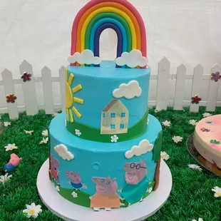 2 tier butter cream frosting cake with fondant decorations