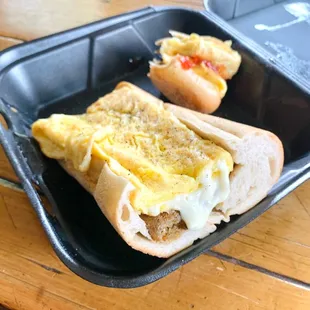 Scrapple, egg, and cheese on a long roll
