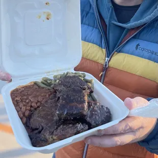 Rib combo with baked and green beans.