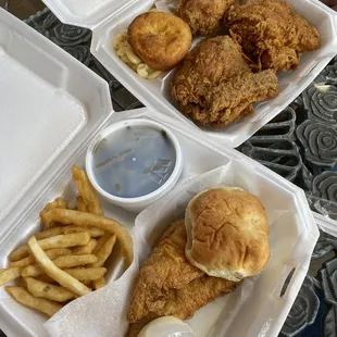 Fried chicken with mac &amp; cheese, mashed potatoes, and cornbread (top) Spicy fried catfish with fries, green beans, and roll (bottom)