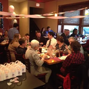 a large group of people eating