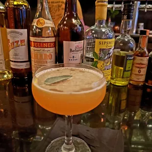 a glass filled with a drink