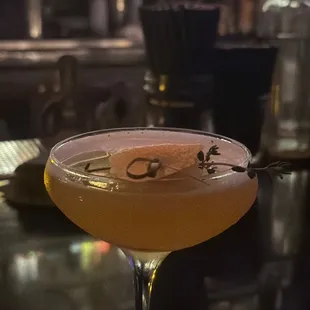a cocktail in a coupe glass