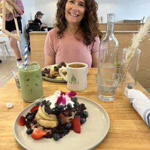 Berry stack, iced matcha latte, scrambled toast, and hot Americano with caramel