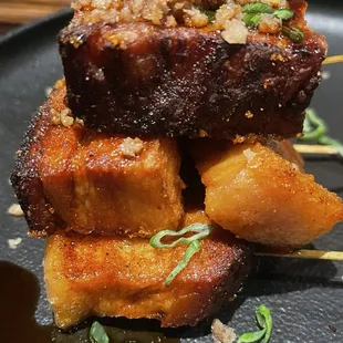 Pork belly lollipops