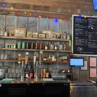 Bar area with distillery room to the right