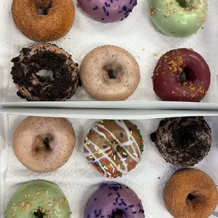 a variety of doughnuts in a box