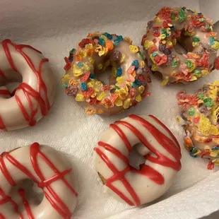 Fruity pebble donuts, raspberry citron donuts