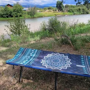 Lounge pad by the water