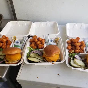 three trays of food on a table