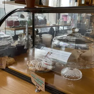 a display case with a variety of pastries