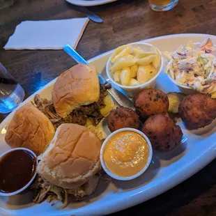 Sliders combo, hush puppies, Mac and cheese, coleslaw
