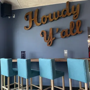 a row of blue chairs