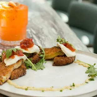 a plate of food and a drink
