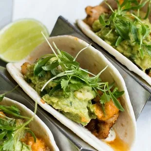 three tacos on a plate
