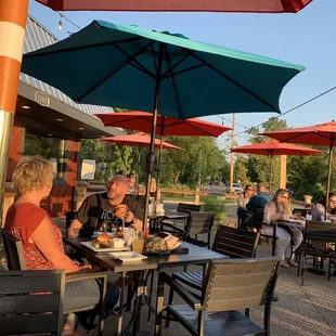 outdoor seating with umbrellas