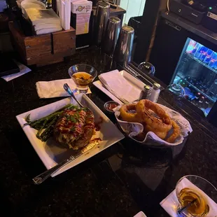 Loaded brisket baked potatoe and onion rings what can I say but yummmy