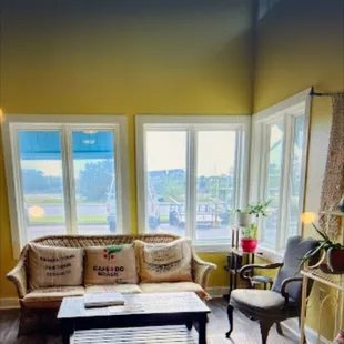 a living room with yellow walls