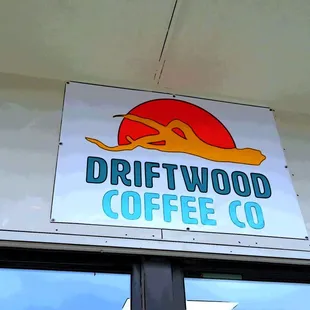 a sign for driftwood coffee co