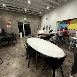 a table and chairs in a coffeehouse