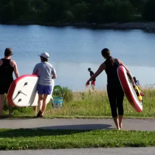 Carrying the boards down to the beaches of Lake Zorinsky.
