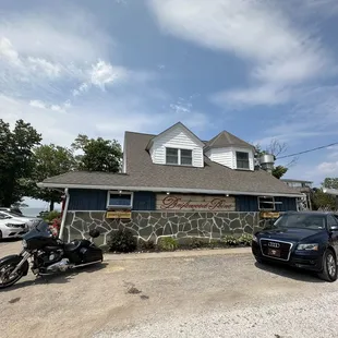 a motorcycle parked in front of a house