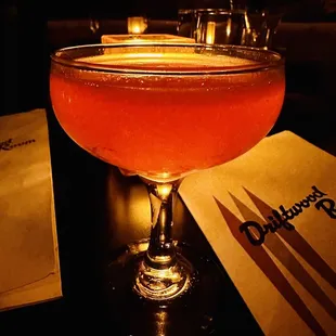 a cocktail in a coupe glass