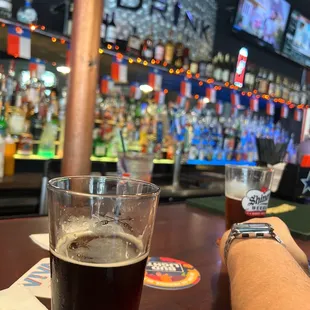 a person sitting at a bar