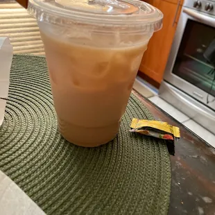 Small iced vanilla latte with almond milk