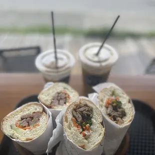 a plate of burritos on a table