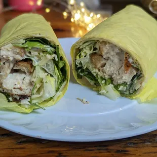 a wrap of chicken and lettuce