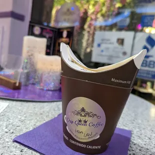 a cup of coffee on a table