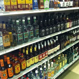 shelves of alcohol in a grocery store