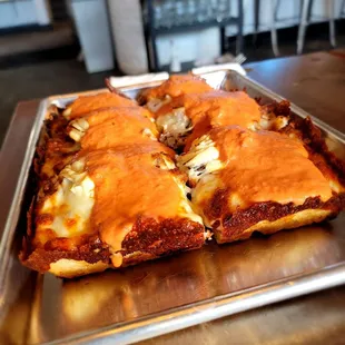 a pan of lasagna on a table