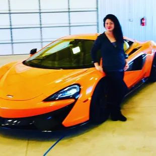 Posing with one of the cars we used for our event #mclaren