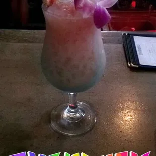 Modern, slightly more upscale tiki bar. Good drinks, friendly staff and an open bar feel. Board games included. Great music playing.