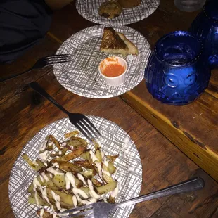 SUCH A JOKE. $25 for this lame ass food. How the are those even considered fries. I'll never go back this place was a rip off.