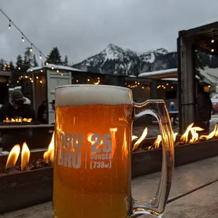 a glass of beer on a table