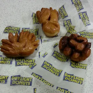 Glazed crab, squid, and pinecone donuts.