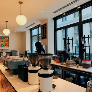 a bari serving a cup of coffee