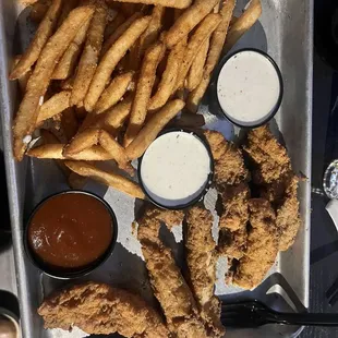 Tenders and blackened fries
